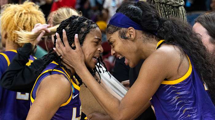LSU’s Angel Reese hugs teammate Alexis Morris after defeating Utah in the Sweet 16 of the NCAA women’s tournament.